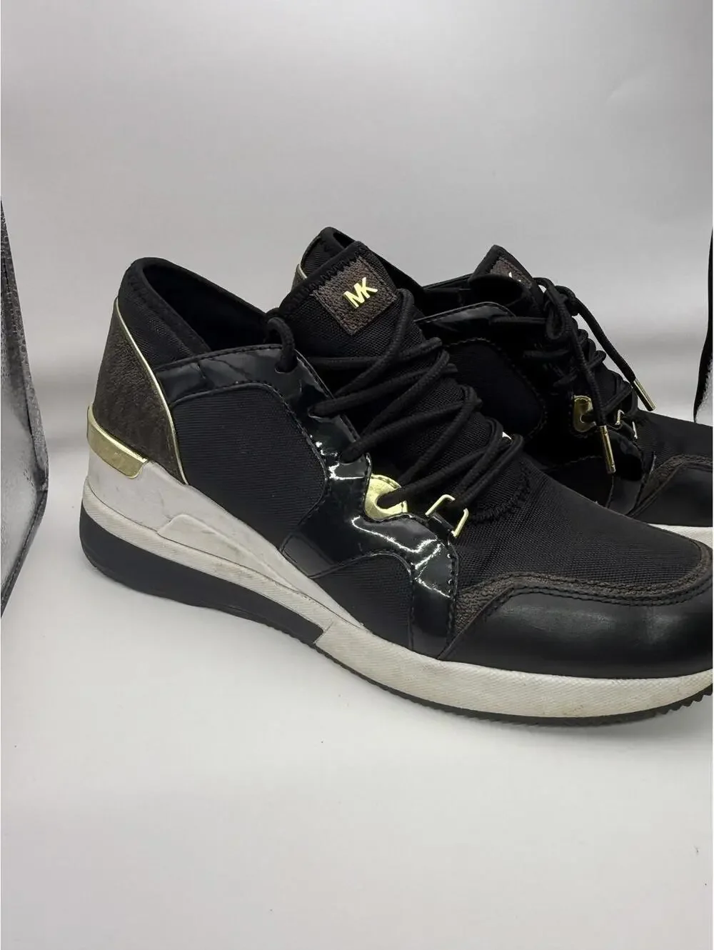 Michael Kors Women's Black and Gold Wedge Sneakers 8.5